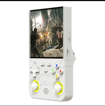 Handheld game console with a screen displaying a video game scene on a white background
